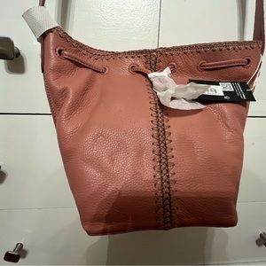 Brand new with tags The SAK handbag in light pink.